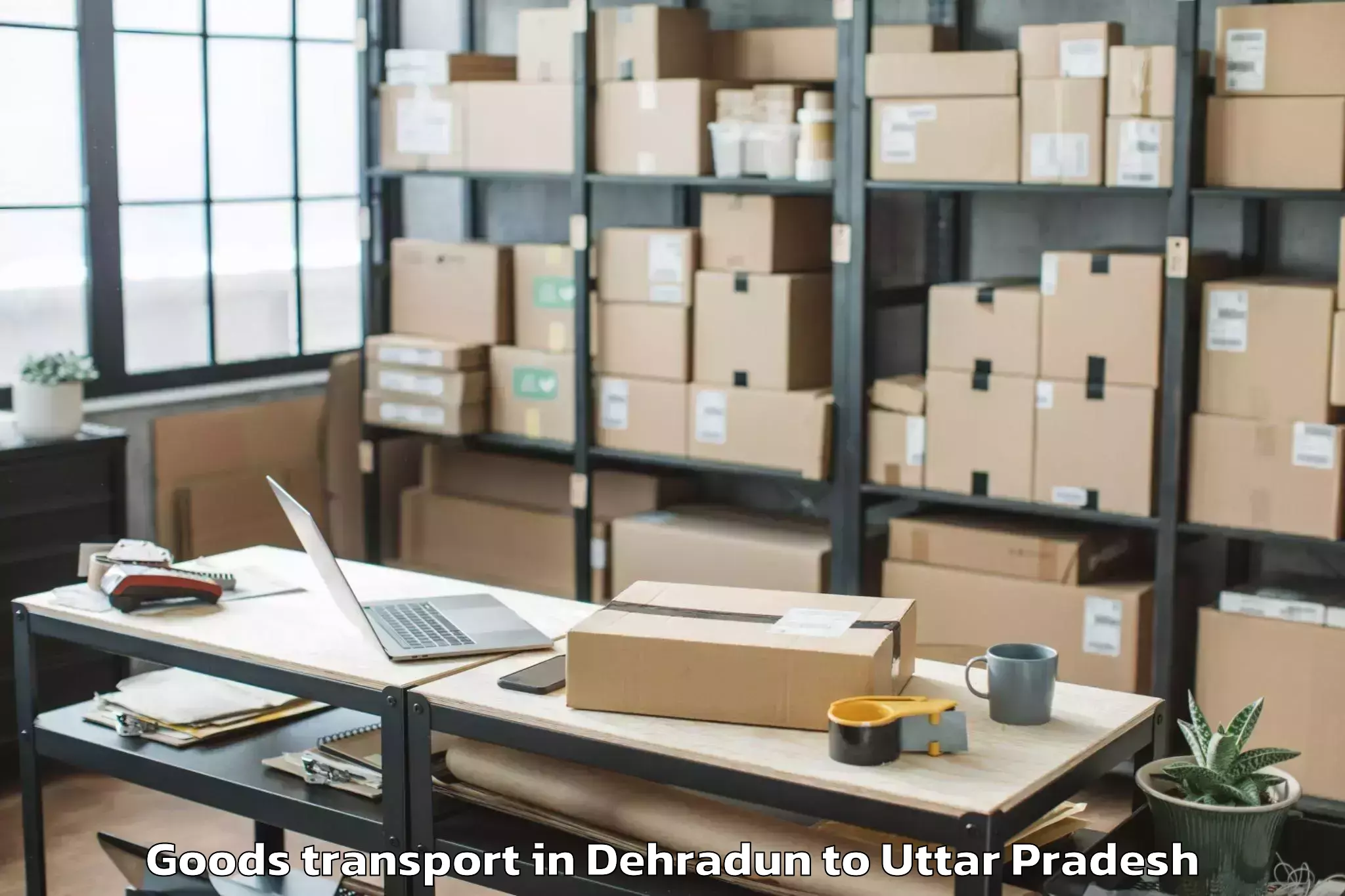 Book Dehradun to Khadda Goods Transport Online